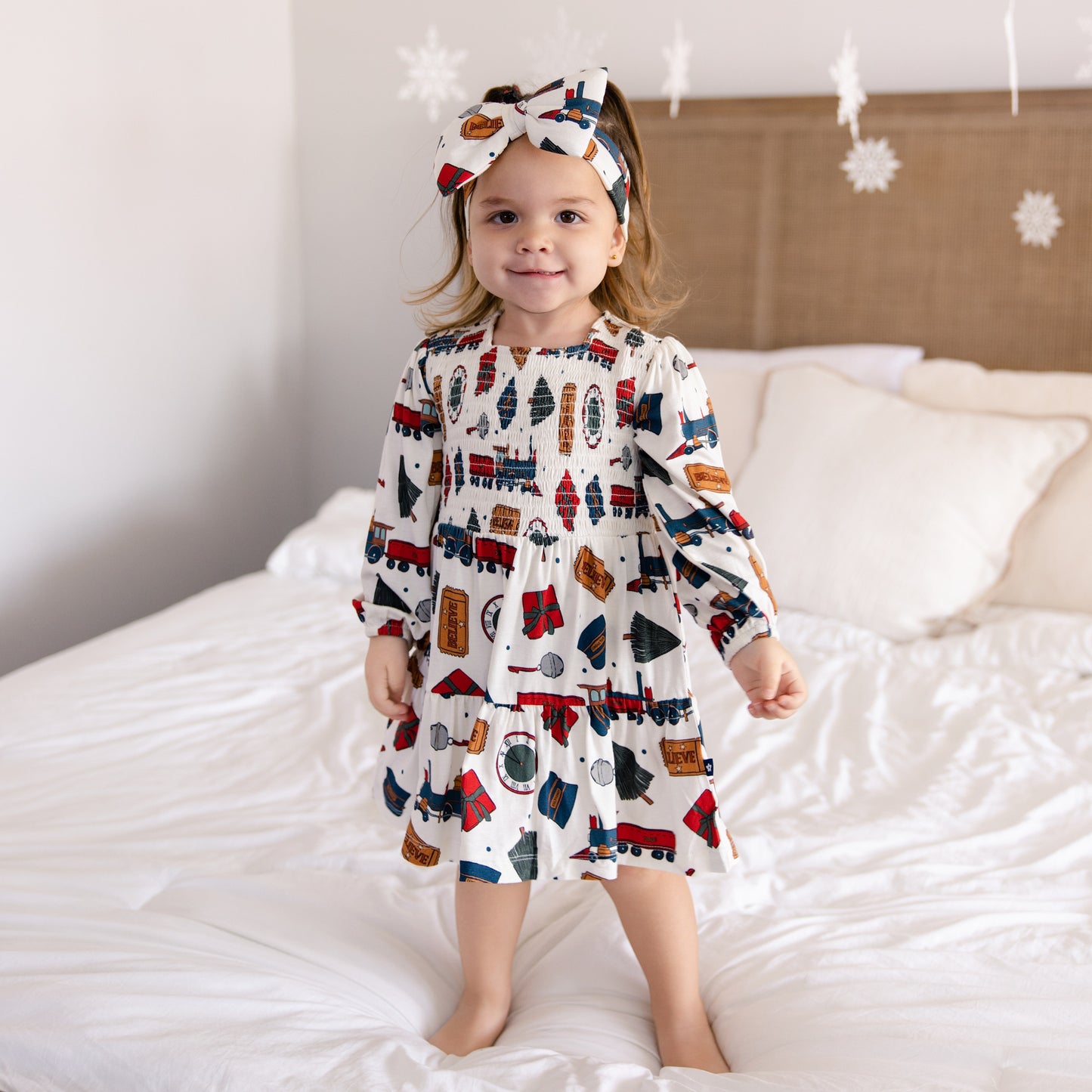 Long Sleeve Smocked Dress in Holiday Express