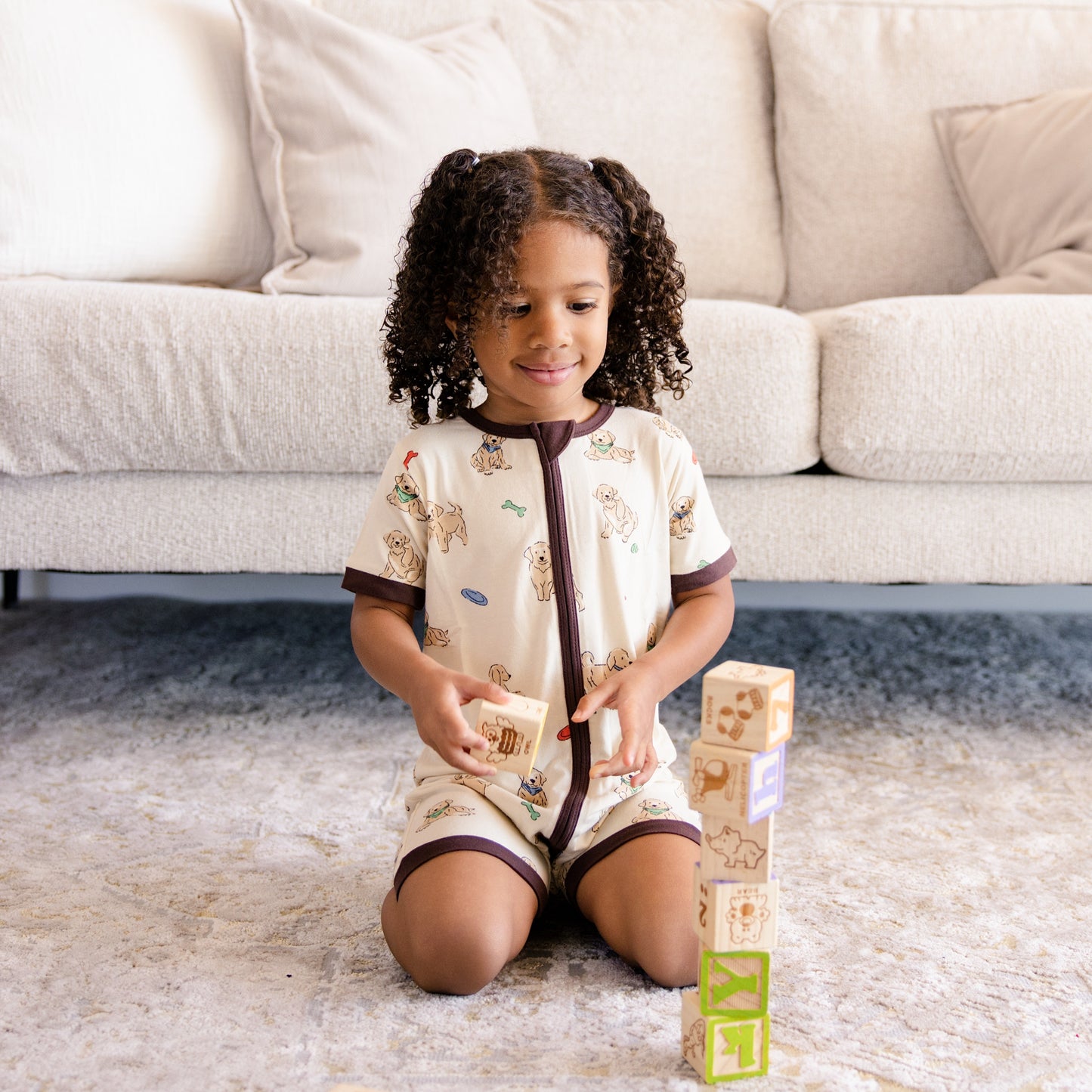 Short Zip Romper in Playful Pups