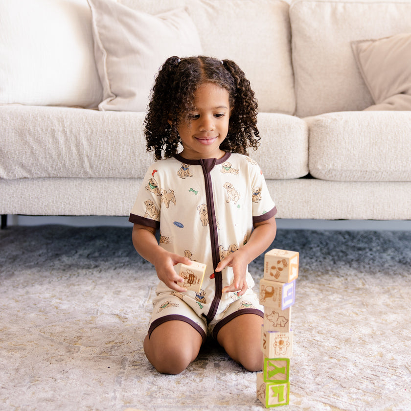 Short Zip Romper in Playful Pups