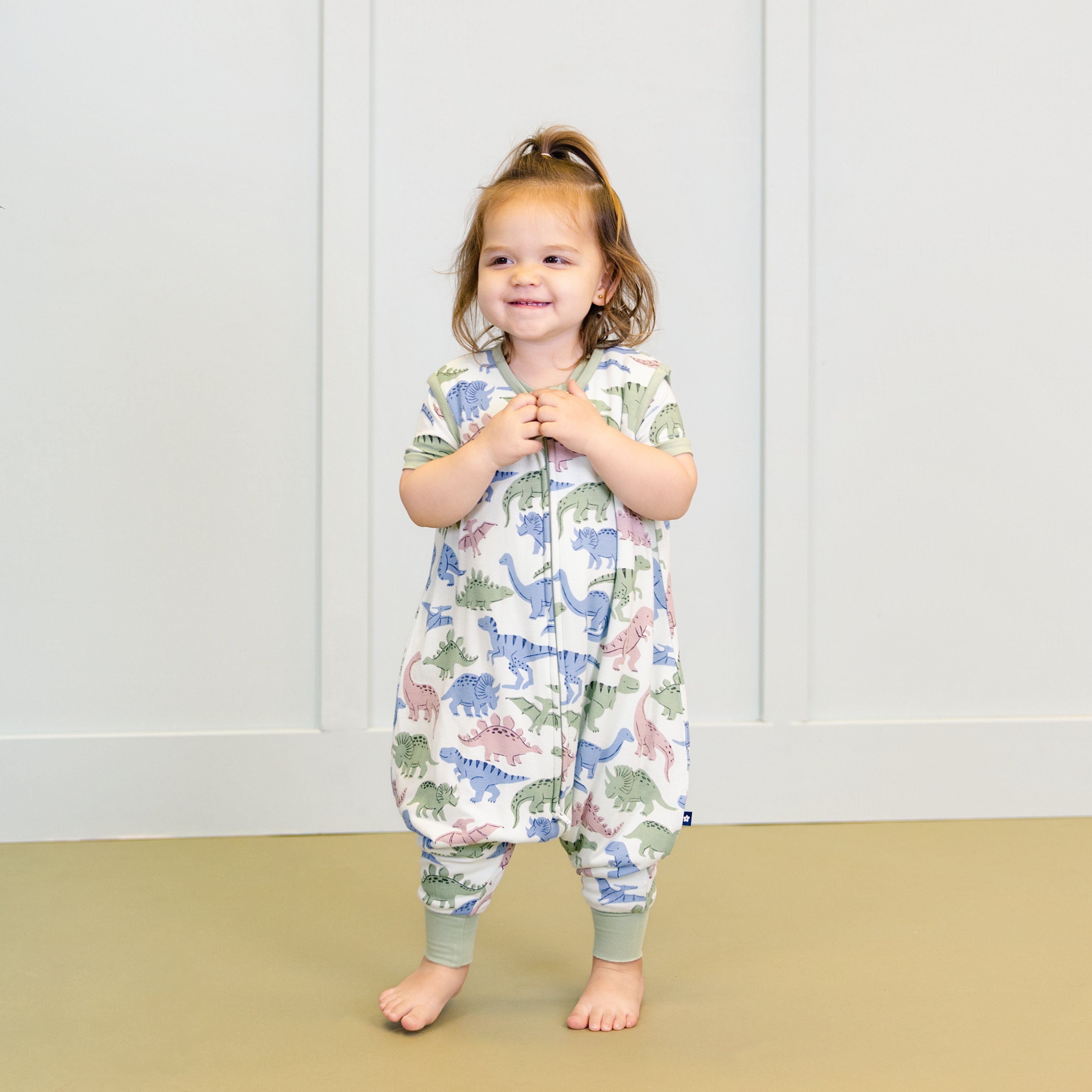 Larkspur Baby Sleep Sack Walker in Prehistoric Pals