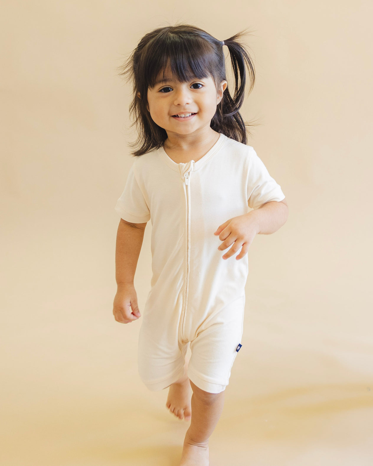 Short Zip Romper in Vanilla