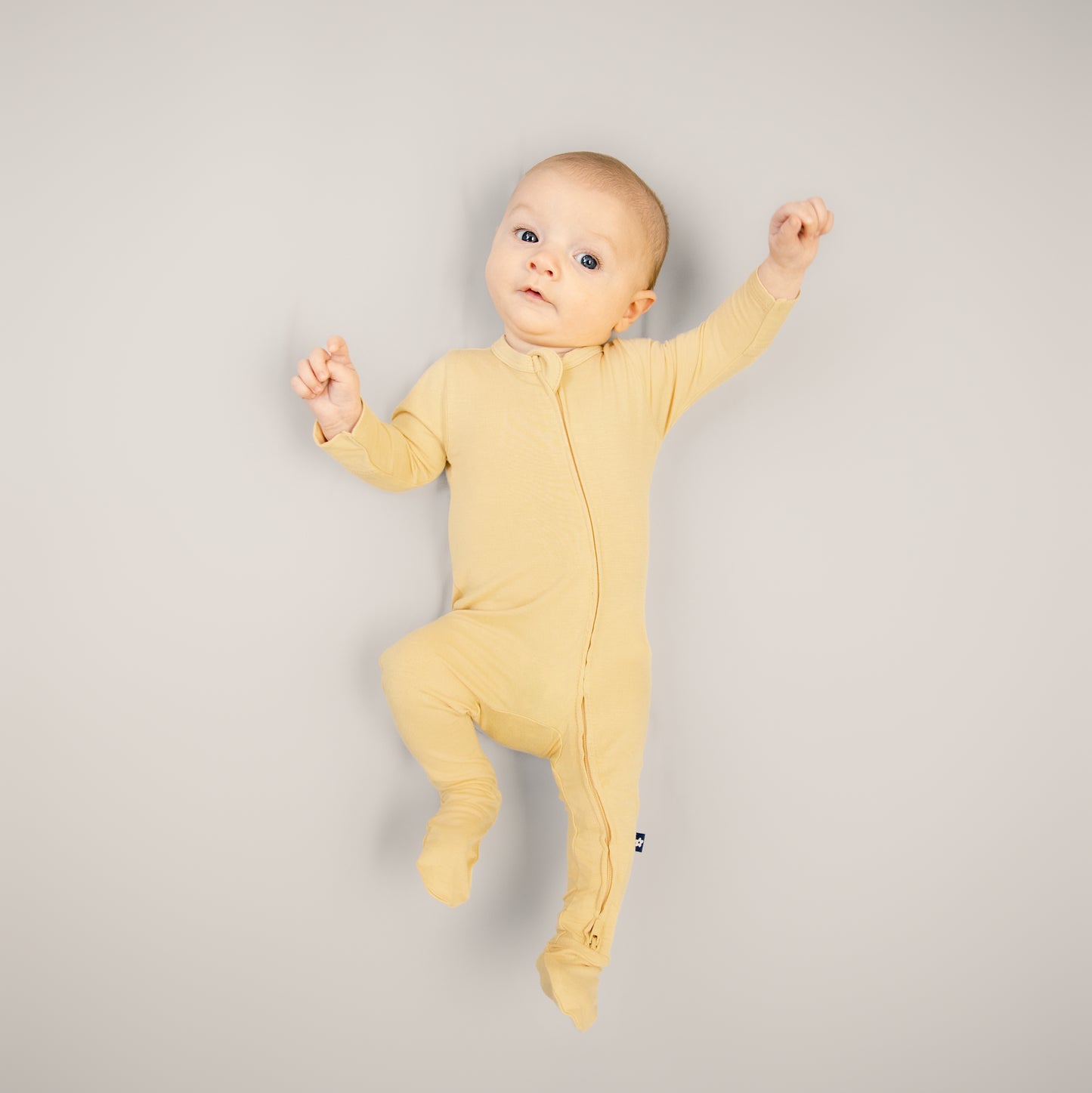 Larkspur Baby Zip Footie in Golden Sand