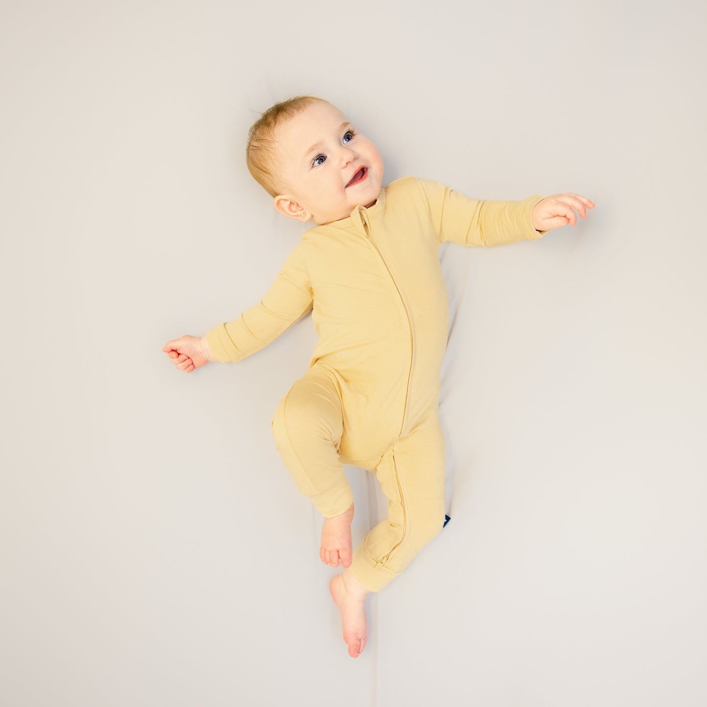 Larkspur Baby Zip Romper in Golden Sand