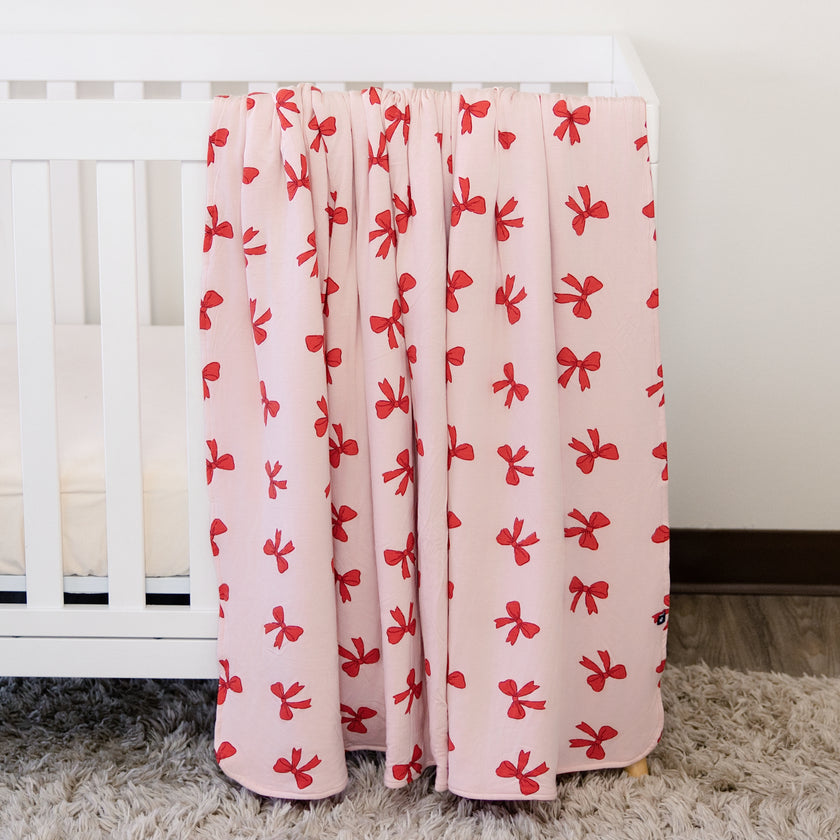 Cozy Blanket in Holiday Bows